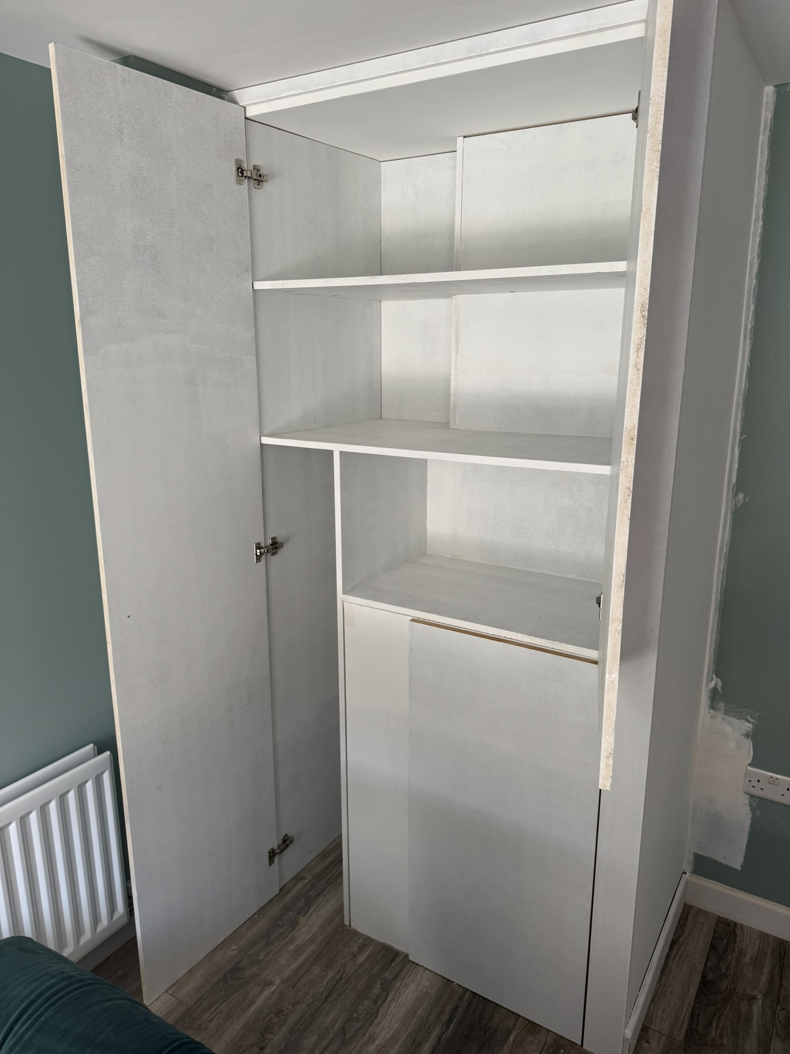 Built-in wardrobe carcass with shelving fitted