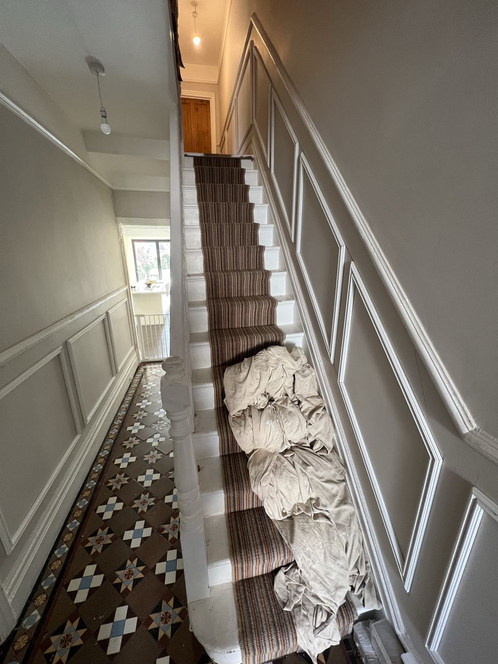 Hallway wall panelling and stair runner