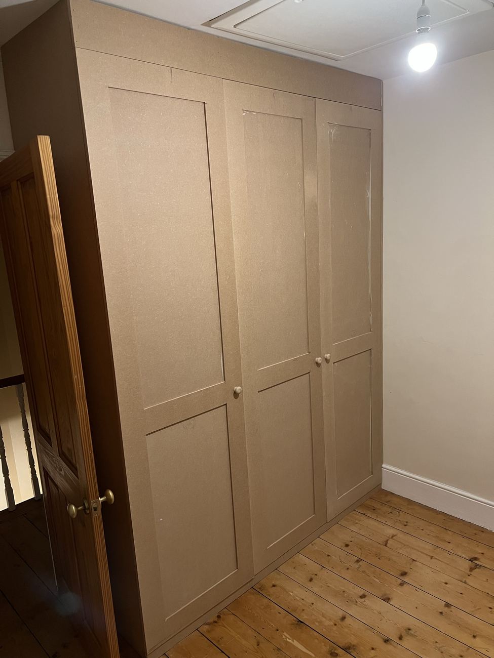 Shaker-style alcove wardrobe