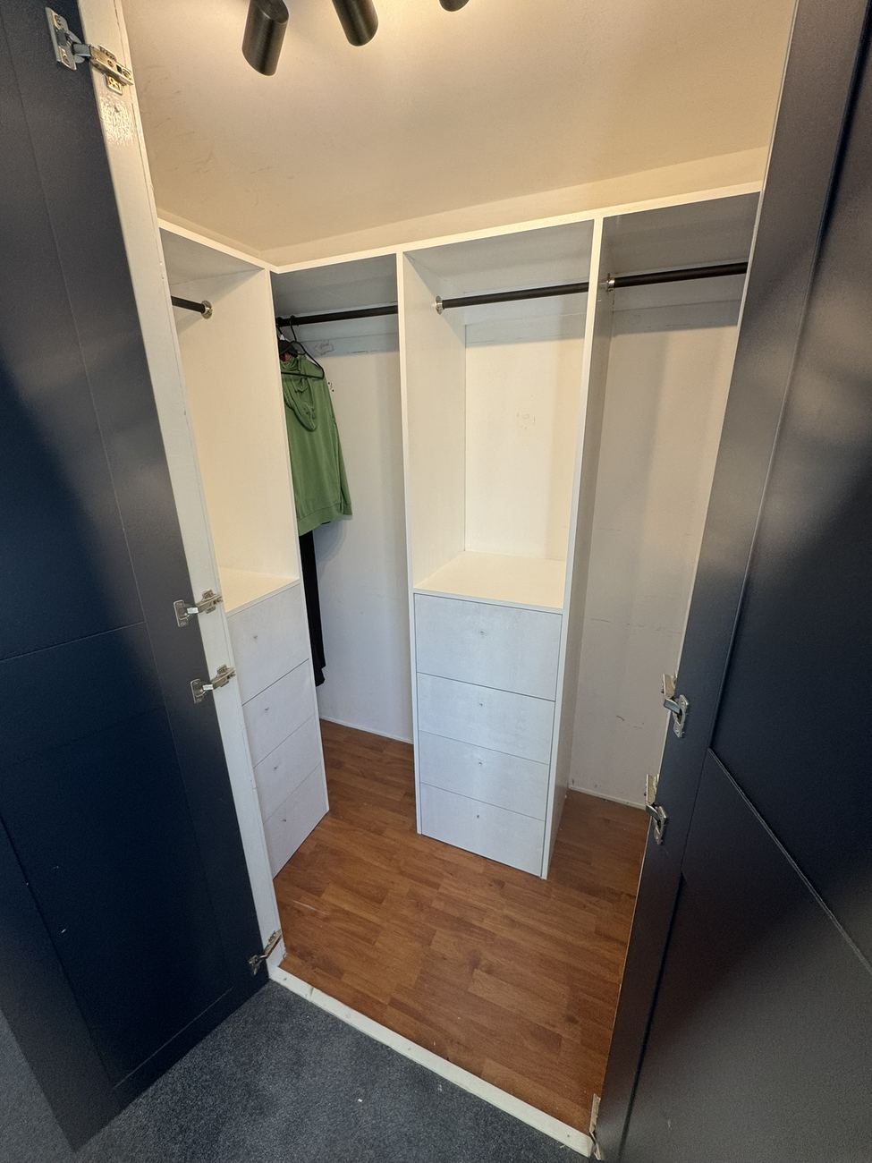 Walk-in wardrobe with drawers and hanging rails