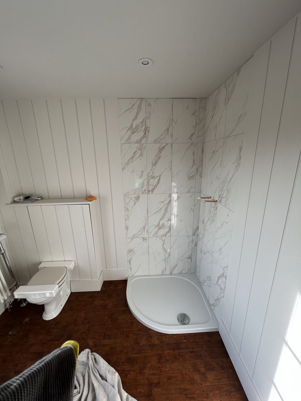 Shower room with tongue and groove panelling